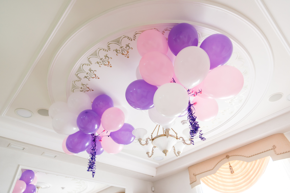 pink, lilac balloons on ceiling