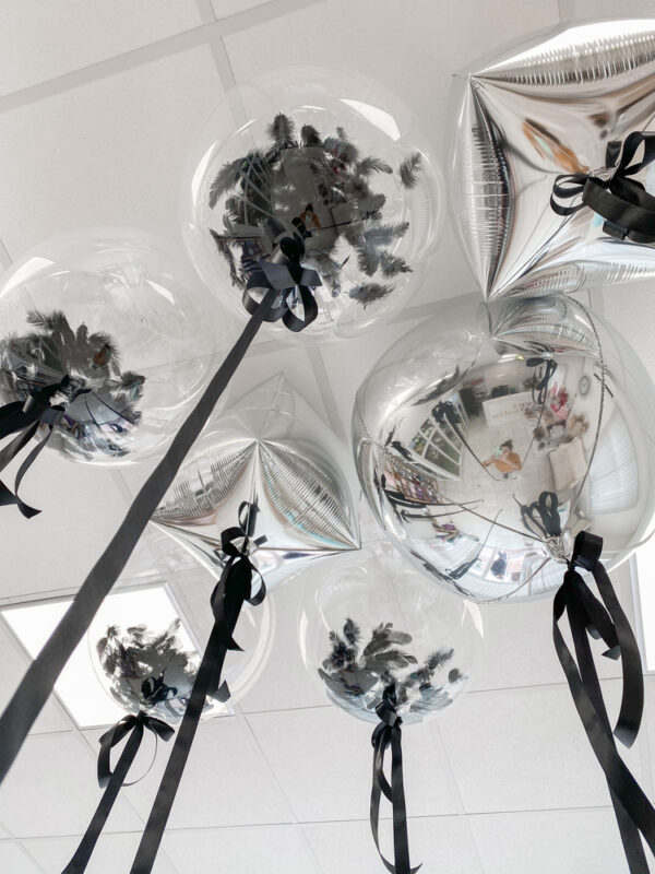 foil and bobo balloons on ceiling